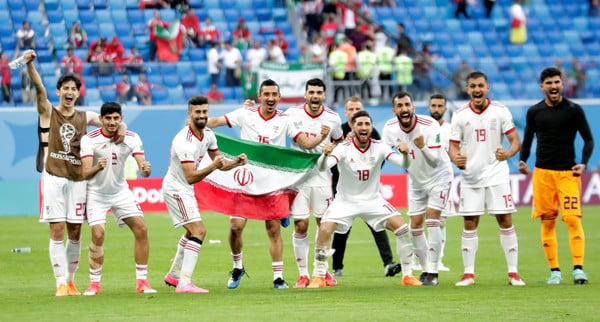 Soccer Football - World Cup - Group B - Morocco vs Iran - Saint Petersburg Stadium, Saint Petersburg, Russia - June 15, 2018   Iran players celebrate after the match    REUTERS/Henry Romero